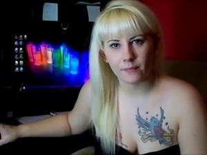 Tatooed blonde tapping fingers. JOI