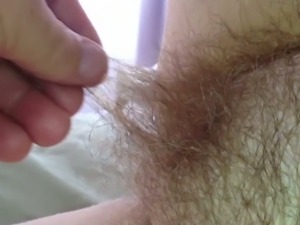 rubbing her warm long hairy pubes.
