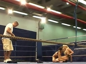 Behind the scenes footage with lesbian fighters Aspen and Blond Cat on the ring