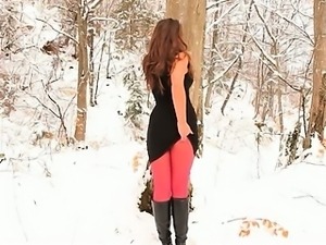 Red nylon pantyhose in winter forest