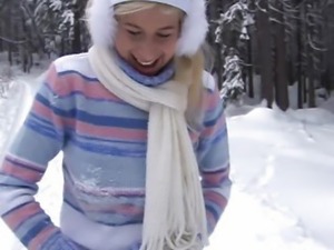 Busty teen Yvonne toy pussy in snow