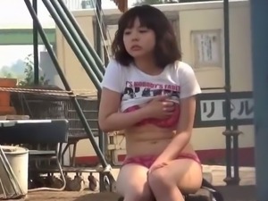 Young japanese masturbates in the park