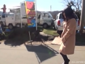 japanese babe flashes her firm tits on the road