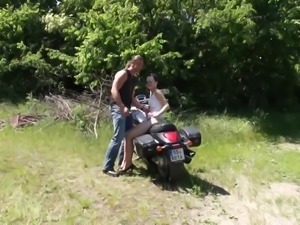 Michaela Fucks Over A Motorcycle Outside