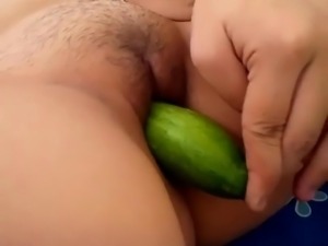 Filipina playing cucumber