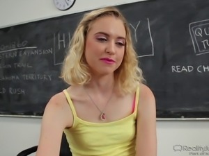 Cute girls in the classroom chatting about sex scenes