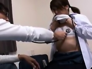 Asian schoolgirl bares her small tits for a doc's stethosco