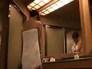 Asian wife is caught on film taking a shower getting ready
