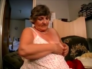 Chunky and busty white granny undresses and masturbates