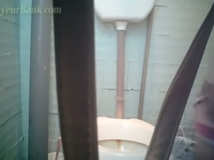 Pale skin lady filmed on hidden voyeur camera in the toilet