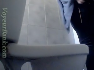 Cute white booty of a stranger girl filmed in the toilet room