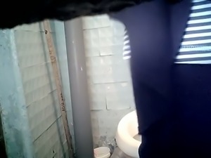 Lovely pale skin stranger chick filmed in the toilet room urinating