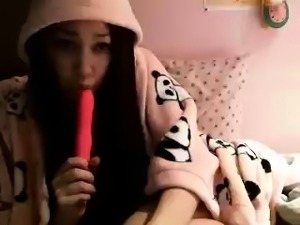 Stunning Asian babe with lovely tits plays with a pink toy