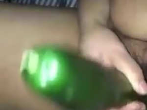 Desi housewife puts 14 Inch cucumber up her pussy