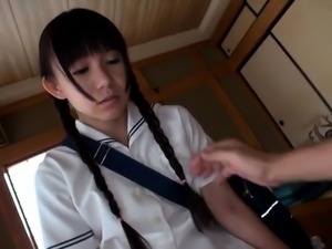 Petite Oriental teen with pigtails is a sucker for hard meat
