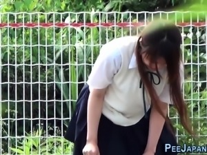 Asian students peeing