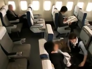 Elegant Japanese stewardess puts her skillful hands to work
