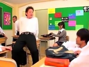 Lovely Japanese schoolgirl gets used by horny boys in class