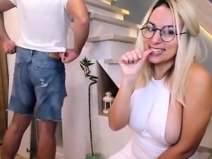 Teen blonde squeezes boobs and sucks big cock