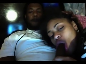 Beautiful ebony girlfriend sucking a black shaft on webcam
