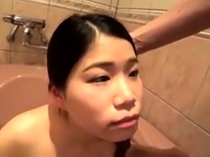 Cute Japanese babe gets pounded doggystyle in the bathroom