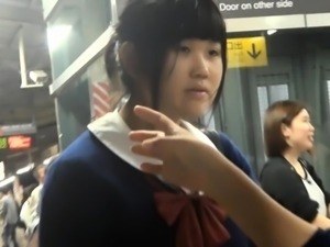 Cute Oriental schoolgirls in uniform public voyeur upskirt