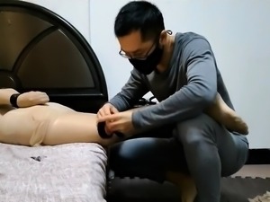 Pantyhosed Asian babe gets trained in bondage on the bed