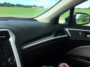 Sensual teen gives her boyfriend a helping hand in the car