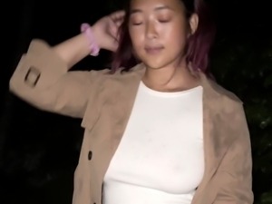 Asian amateur gives an outdoor blowjob