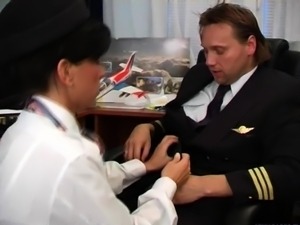Hot flight attendant Simone Peach sucking the pilot's big