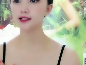 Tiny japanese babe outdoors showing boobs off